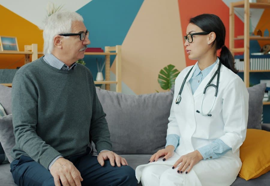 A support worker visiting a client at home
