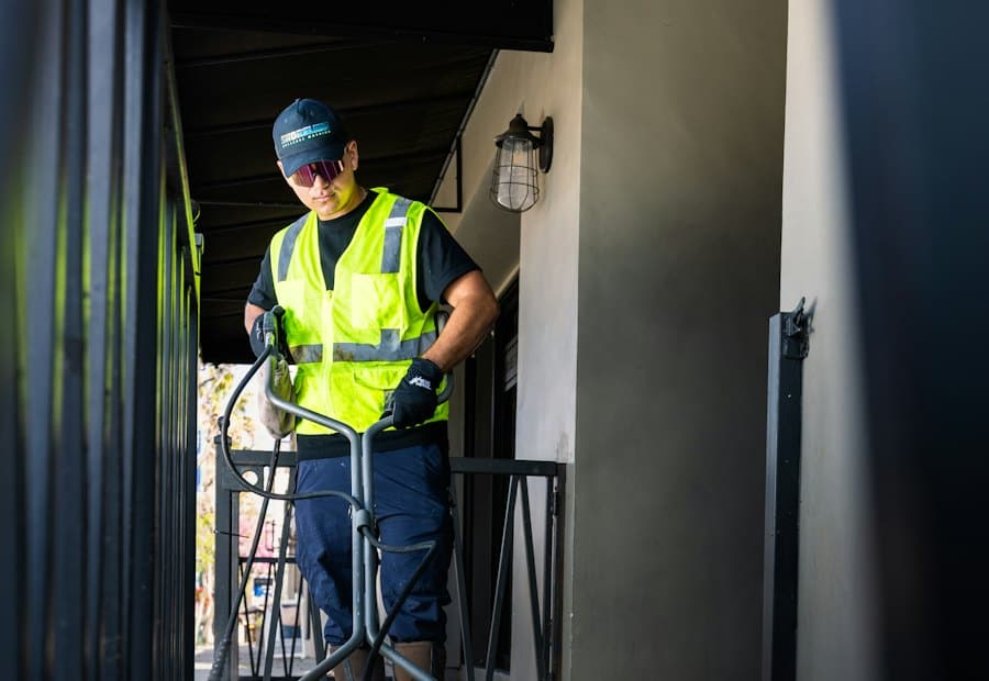 A cleaner with equipment at a commercial site